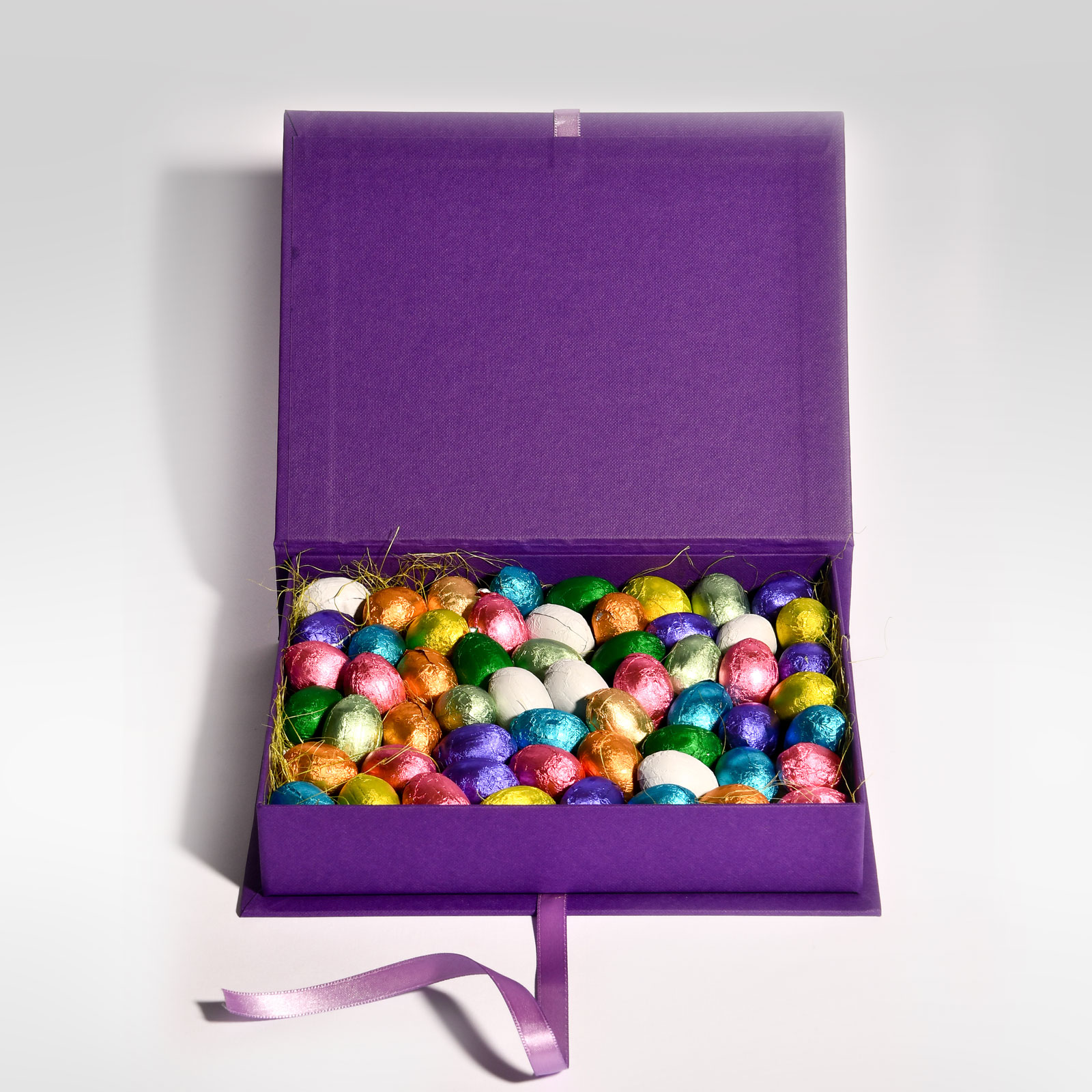 Scatole-piccole-ovetti-incartati-2025-viola
