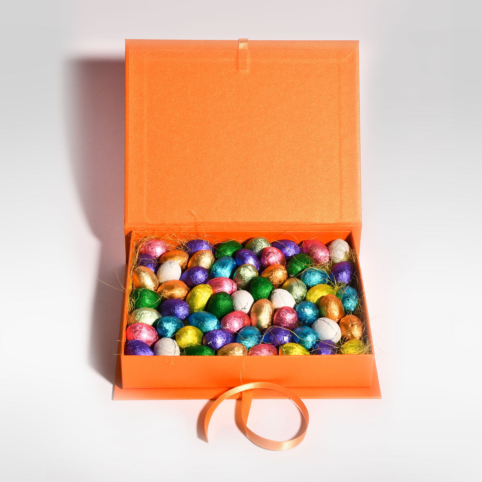 Scatole-piccole-ovetti-incartati-2025_arancio